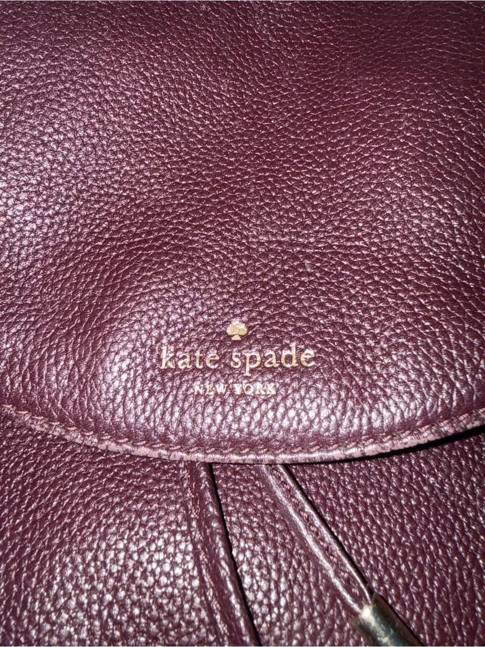 kate spade dark brown pebbled leather backpack with gold hardware